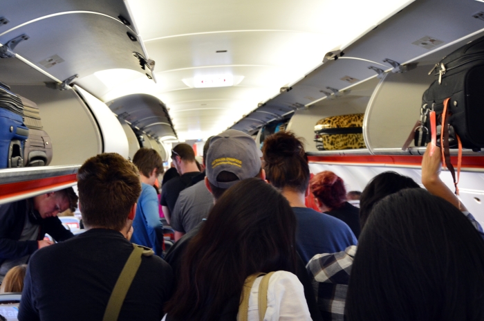 people getting off a plane