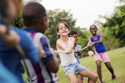 children playing tug of war