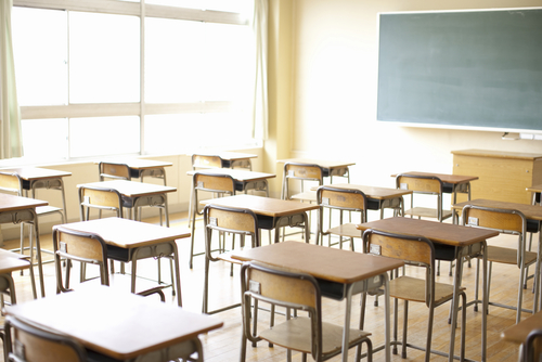 Picture of desks in a classroom.