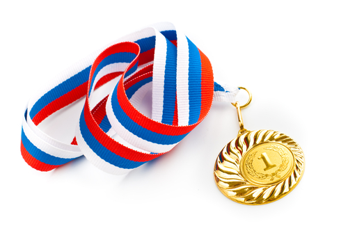 Golden medal on red blue and white ribbon