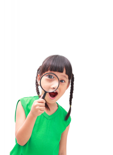 girl surprised magnifying glass