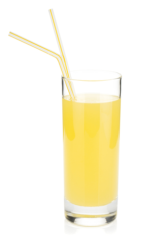 glass of orange juice with straws