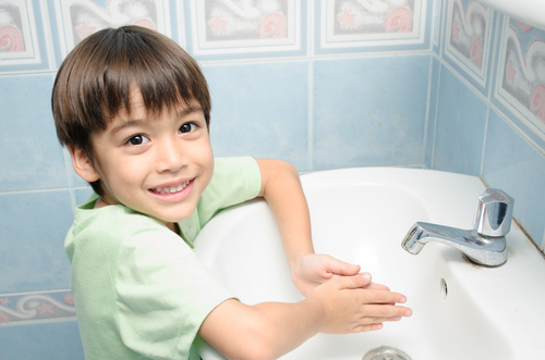 boy washing hands