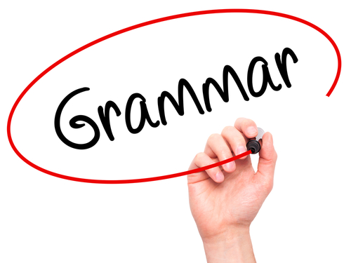 hand writing the word grammar