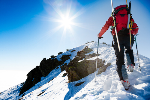 climber on snowy mountain