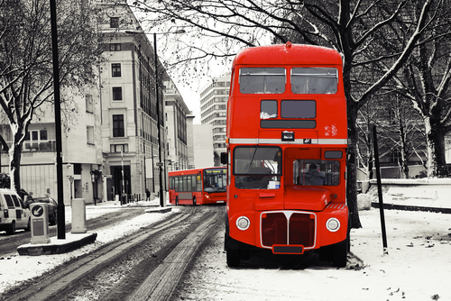 snowy london scene red bus