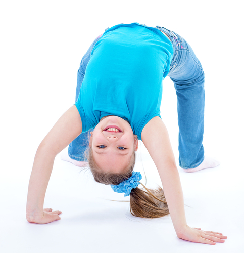 A child bending over backwards