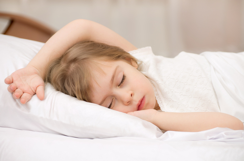 girl asleep in bed