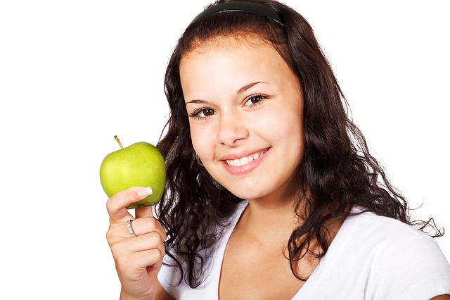 Girl eating apple