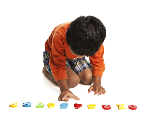 boy counting counters