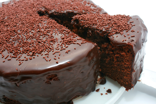 Chocolate cake with a slice cut