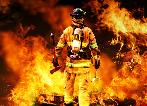 firefighter walking into fire