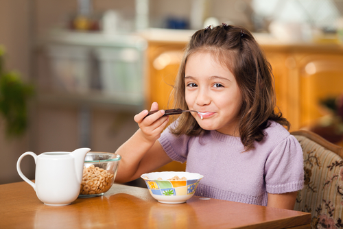 girl eating cereal