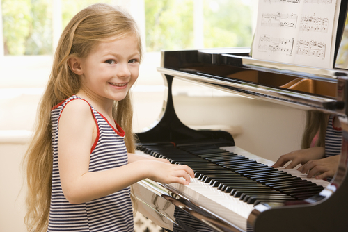 girl playing paino