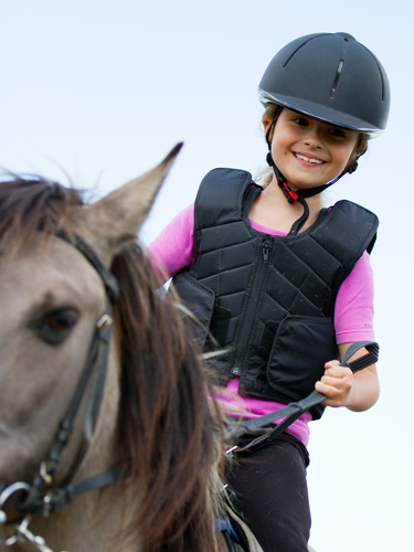 girl riding horse