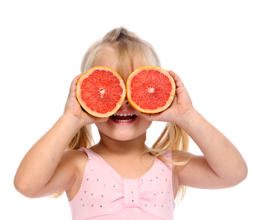 girl with grapefruit for eyes