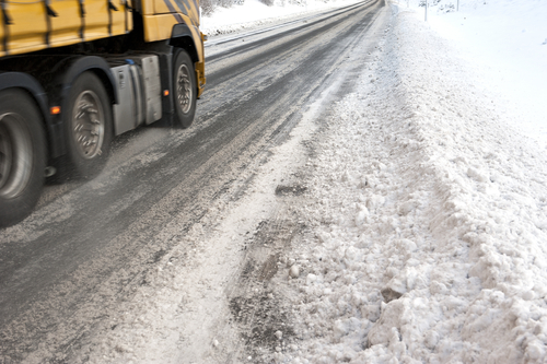 grit and snow on road