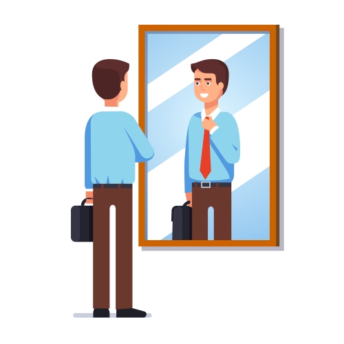 man looking at reflection in mirror