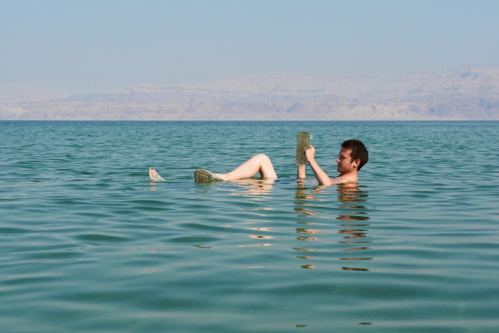 man floating in Dead Sea