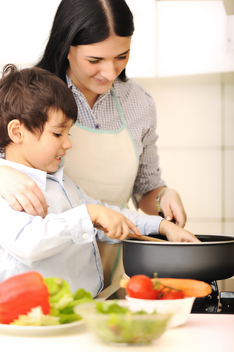 mum and daughter cooking