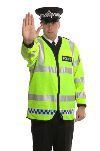   a policeman saying stop