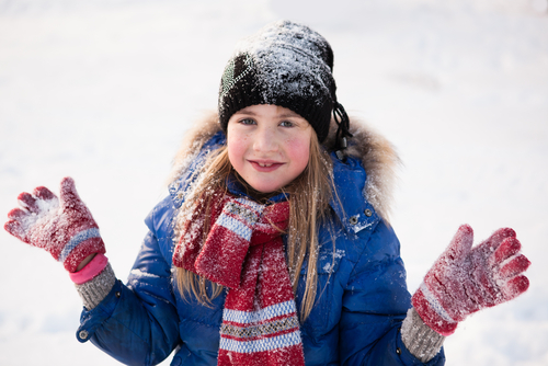 girl happy in the snow