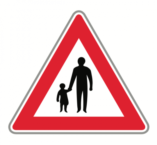 road sign showing parent and child