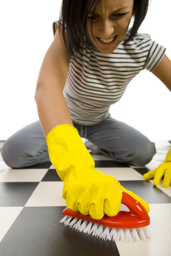 woman scrubbing floor